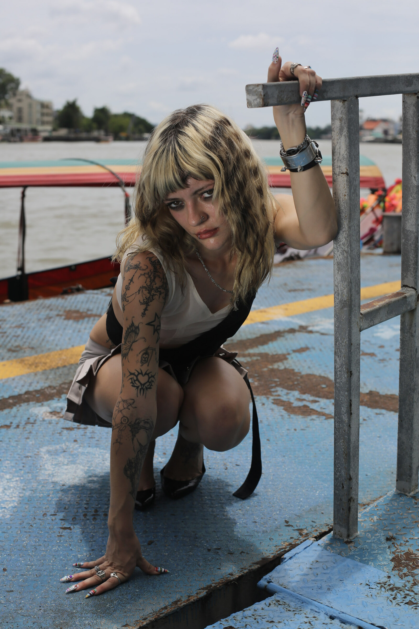 Crouched on the ferry deck