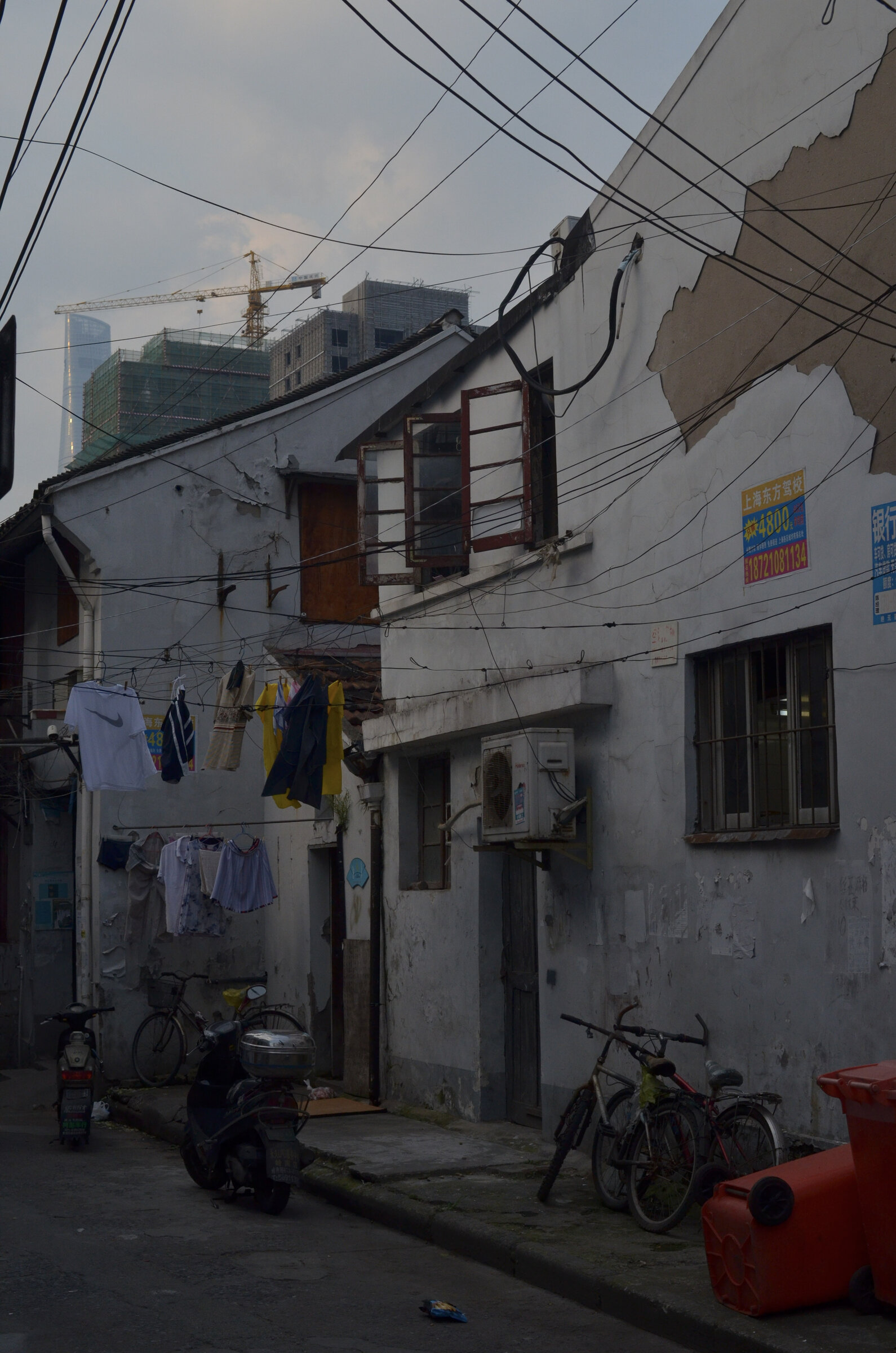 Narrow alley, laundry overhead
